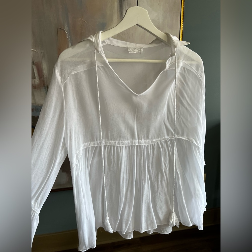 See-through white drapey shirt